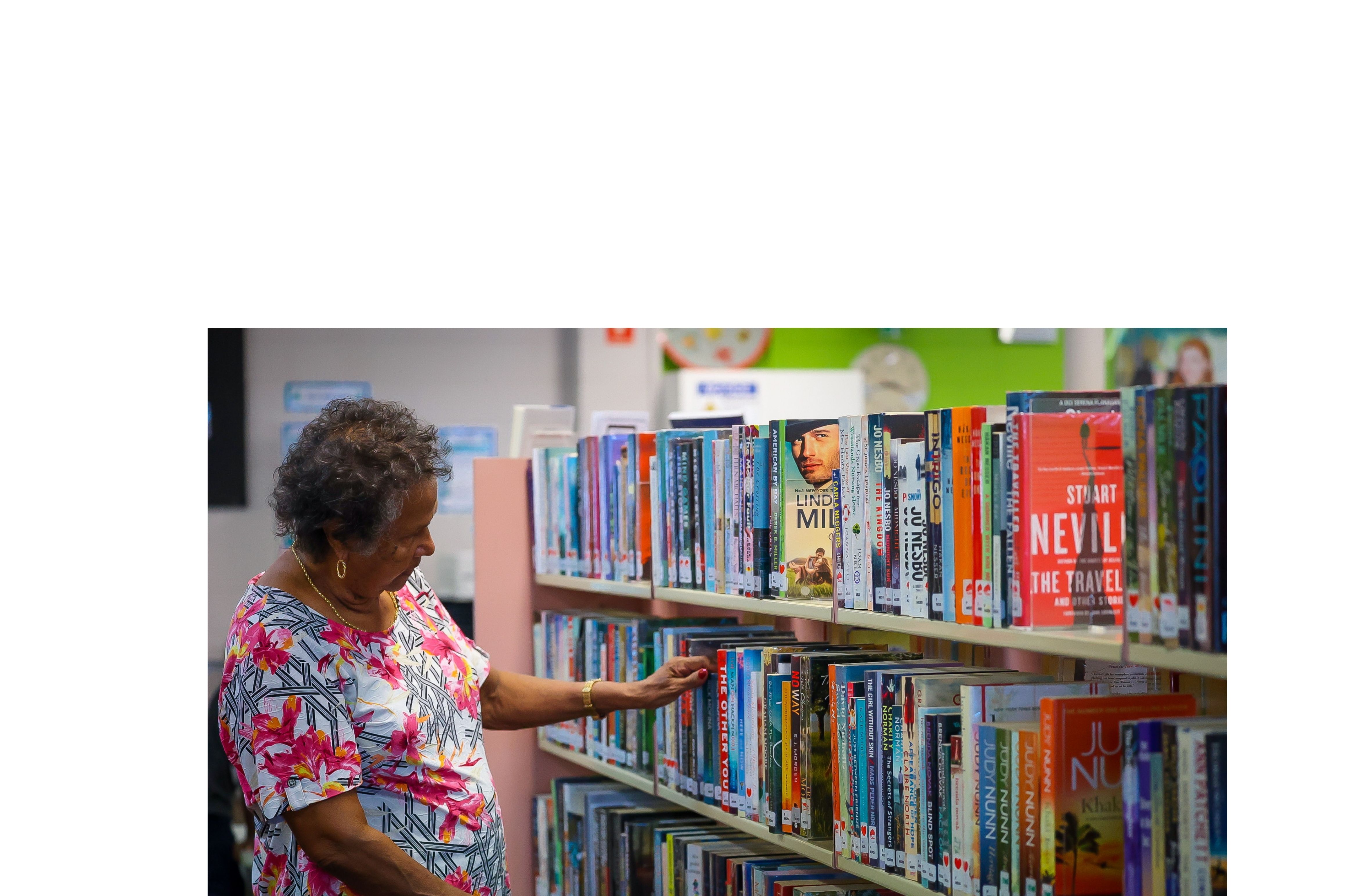 woman looking at books