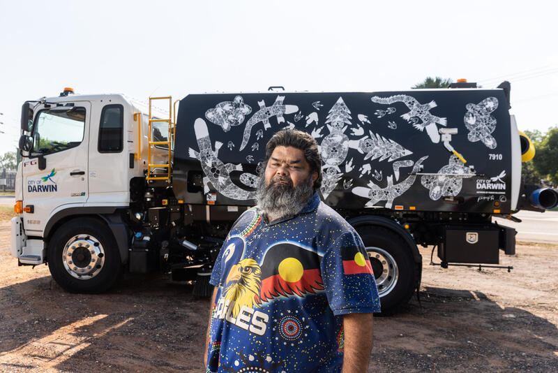 Fabian McLennan with his streetsweeper artwork
