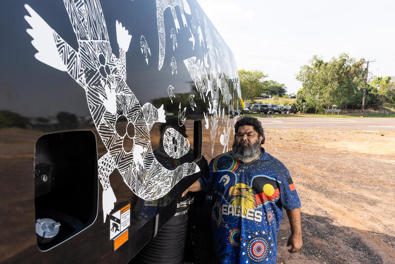 Fabian McLennan with his streetsweeper artwork