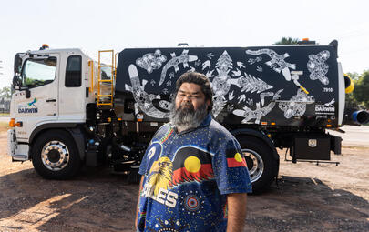 Fabian McLennan with his streetsweeper artwork