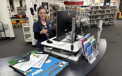 Libraries team adds Young Authors books in system