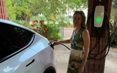 Staff charging electric vehicle