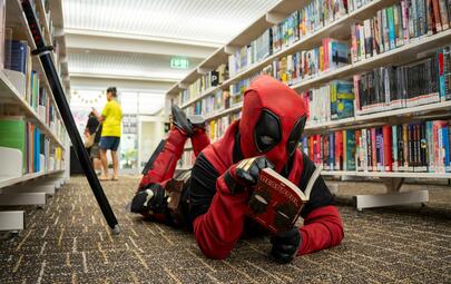 image of a young person dressed up as Deadpool