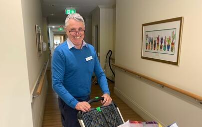 Man pushing trolley 