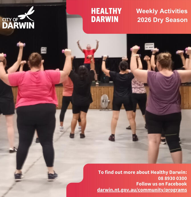 social media tile - zumba class instructor on a raised stage as participants follow along in the main hall area