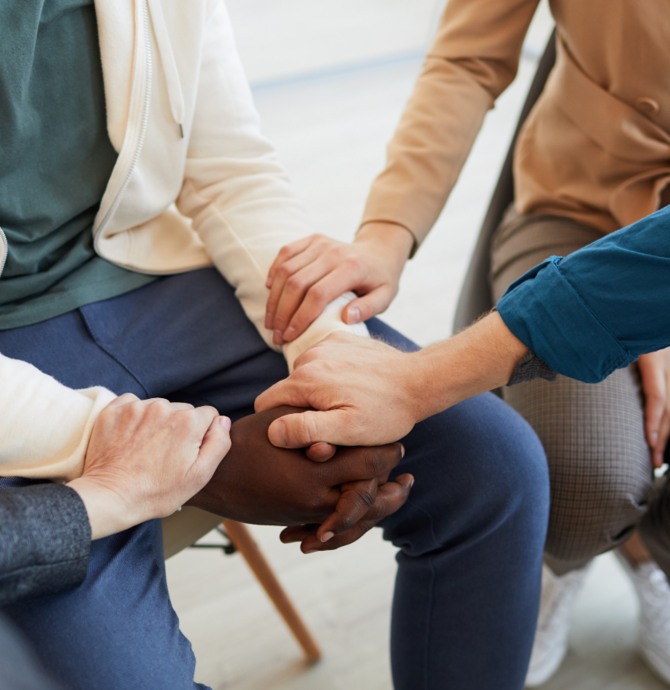 image of a several hands linking