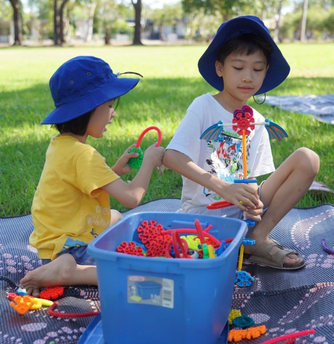 image of two children playing with blocks