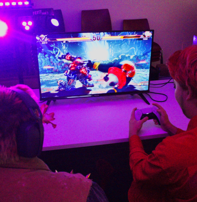 Young people playing a console game