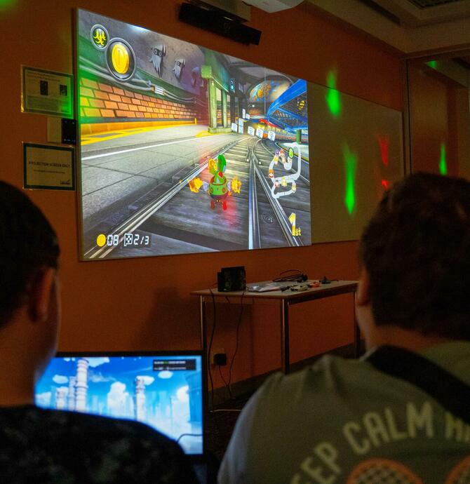 image of young people gaming after dark