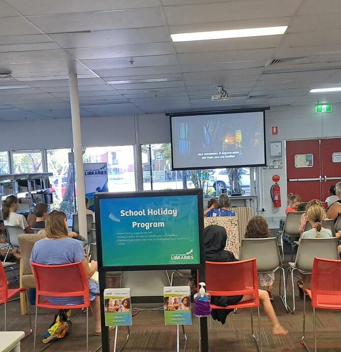 image of movie screening at the library
