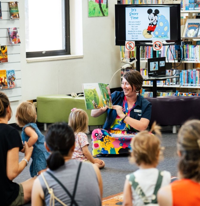 families enjoying story time