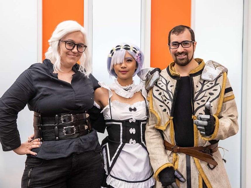 3 young people in various cosplay outfits