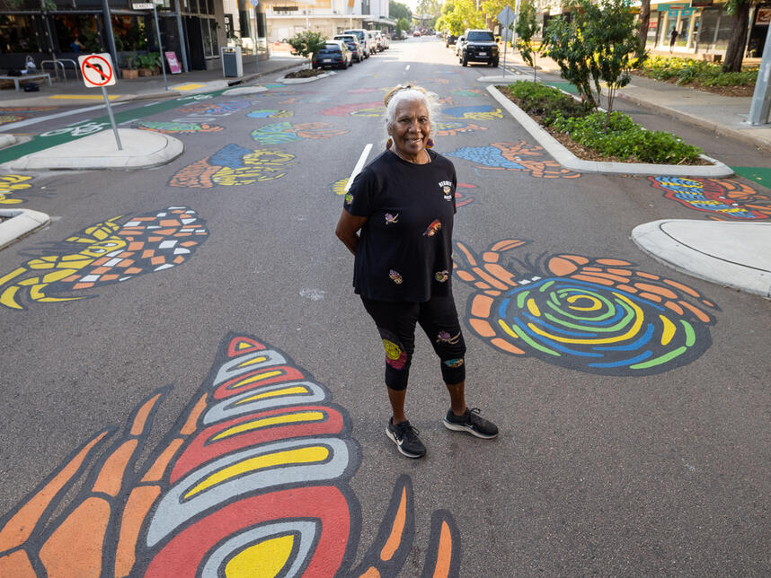 Hermit Hustle. Hand painted mural on road surface. Cnrs Smith and Searcy streets.