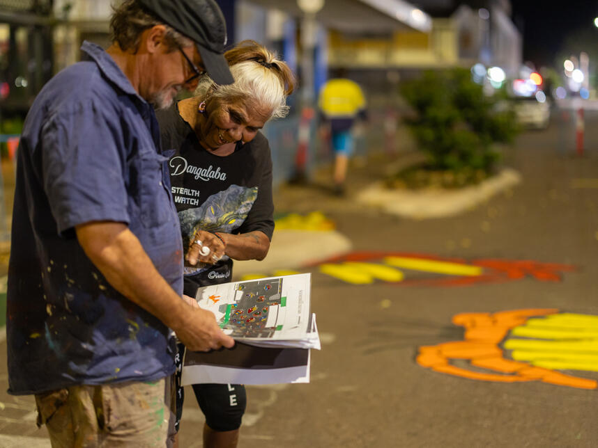 Proper Creative's, David Collins working with Denise Quall during the install.