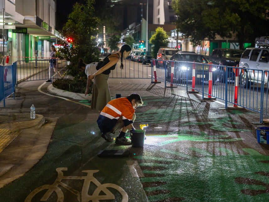 Proper Creative's David Collins working with Minna Leunig during the install.