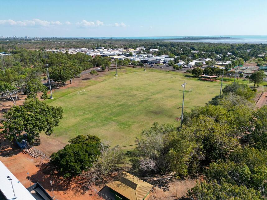 aerial view of Bagot Oval with CBD and Darwin Harbour in the background