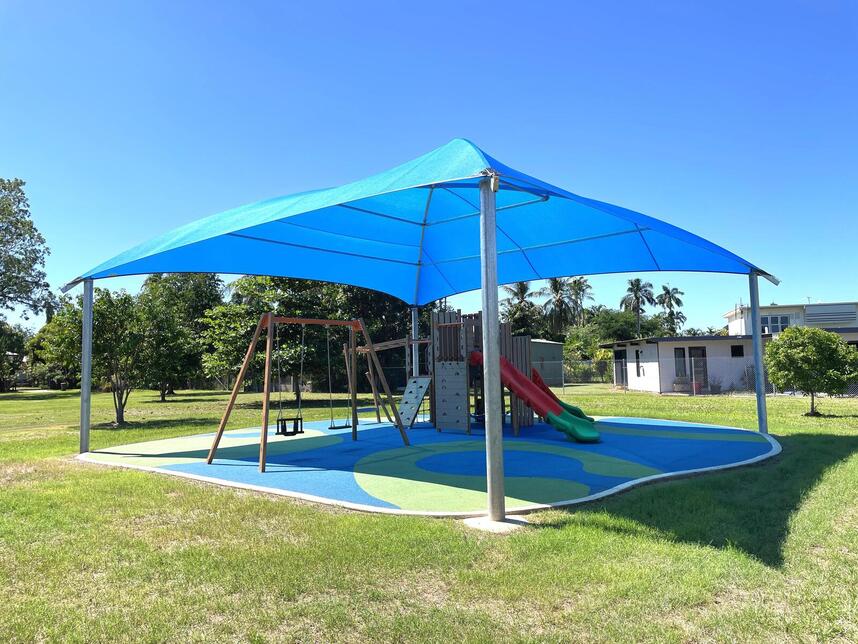 Shaded playground - swings and slides (side angled view)
