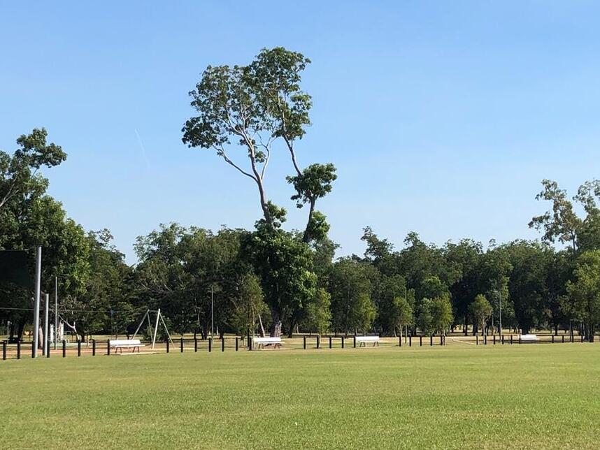 pano showing some of the playground and oval spectator seating along the boundary fenceline
