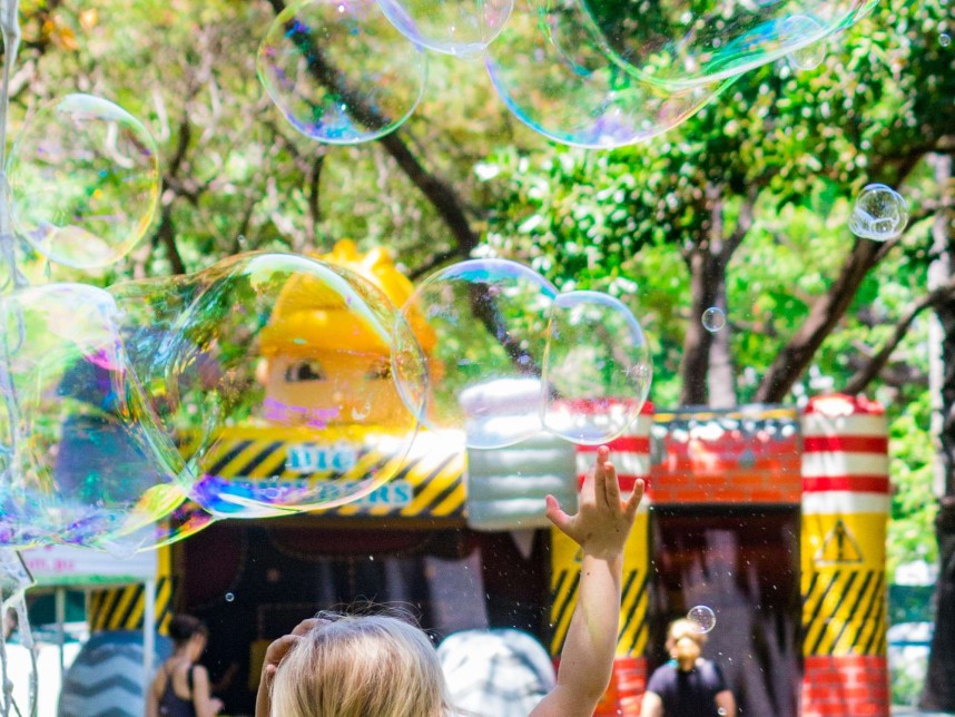 Children playing with bubbles
