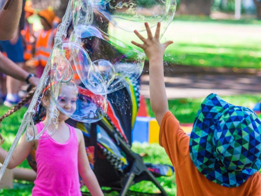 Children playing with bubbles