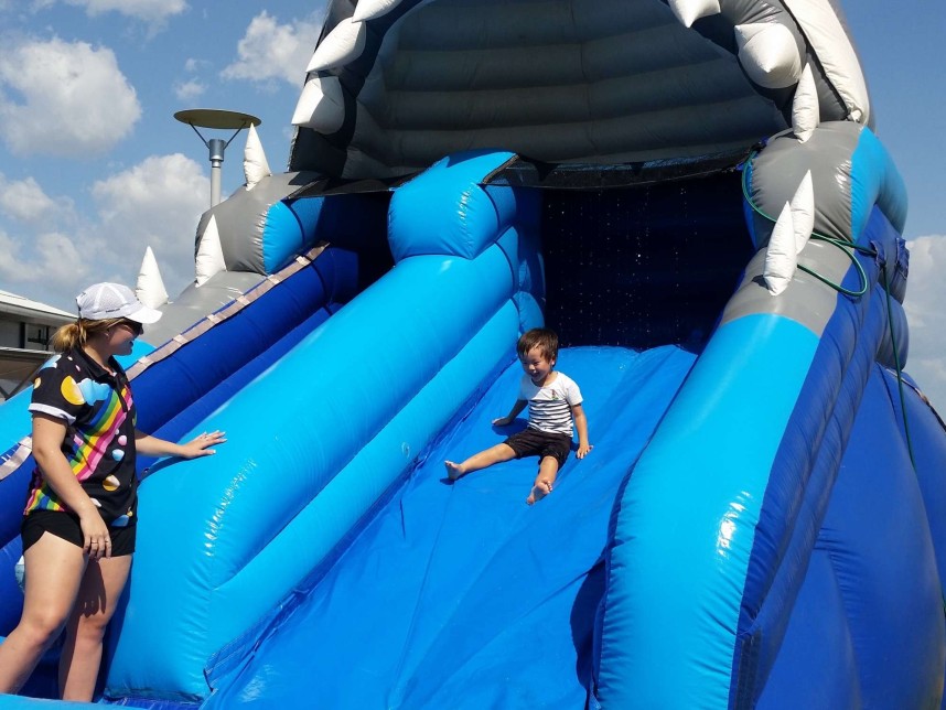 Child sliding down a waterslide