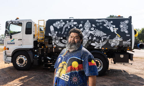 Fabian McLennan with his streetsweeper artwork