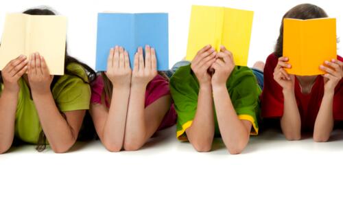 image of young people looking at books