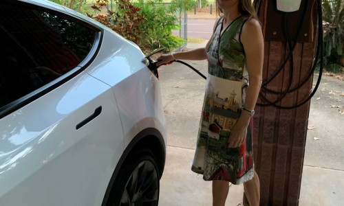 Staff charging electric vehicle